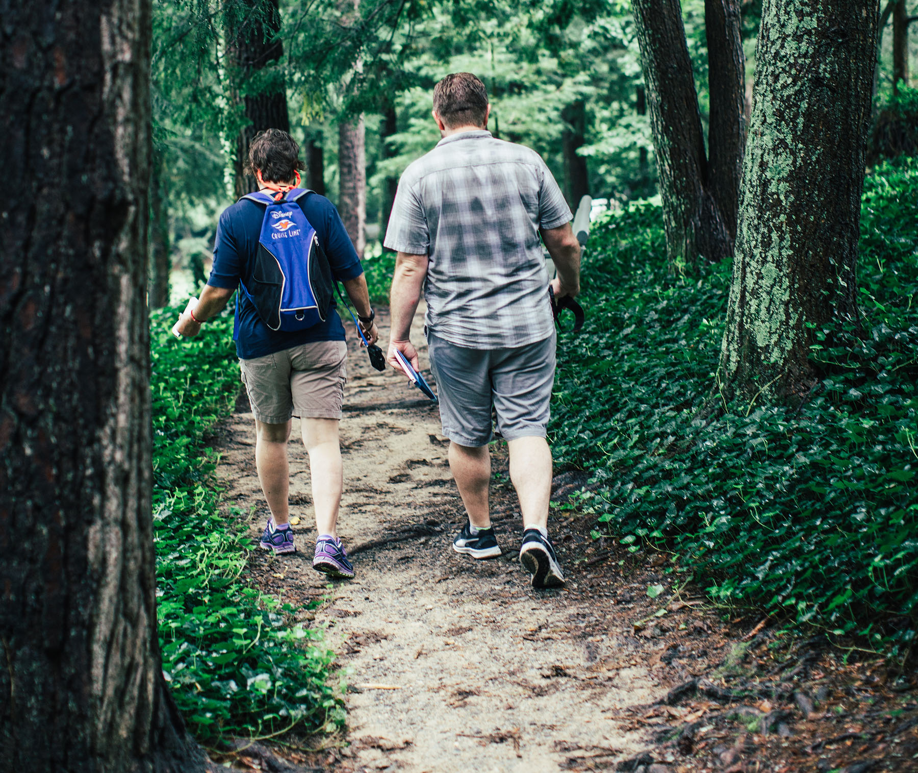 couple hiking through woods