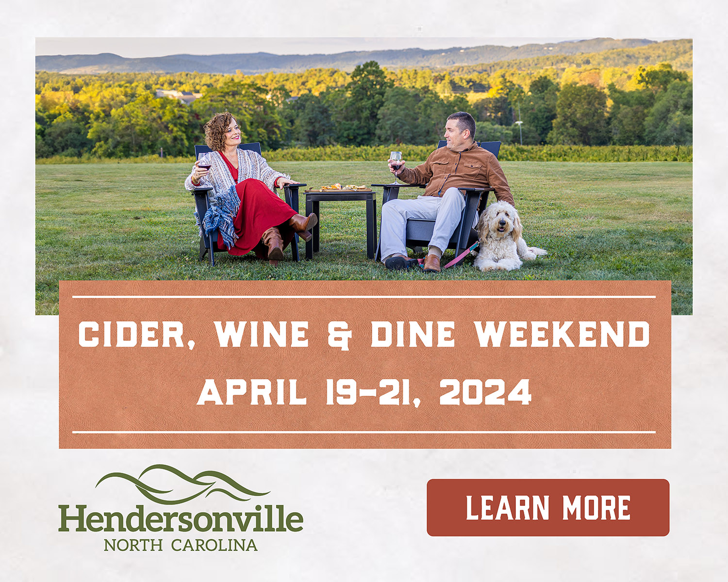 rectangle-ad banner ad with couple drinking wine in a field with their dog and words that say cider, wine and dine weekend, April 19 to 21, 2024